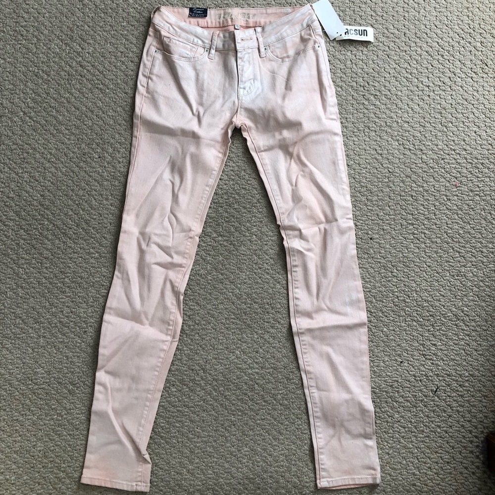 Light pink skinny jeans